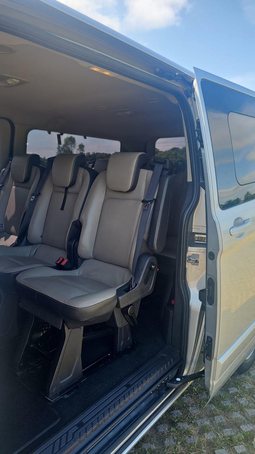 Leather passenger seating inside the MC Transfers minivan